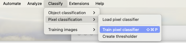 Screenshot of QuPath `Classify` menu showing the `Pixel classification` submenu with `Train pixel classifier` selected.