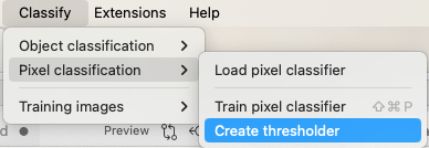 Screenshot of QuPath menus: Classify > Pixel classification, with `Create thresholder` highlighted in blue.